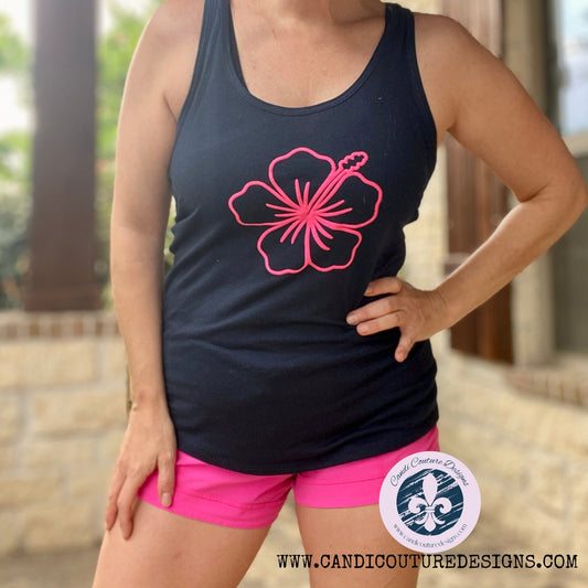 Get ready for your girls&#39; trip with our navy tank top featuring a hot pink puff hibiscus design. Stylish, comfortable, and perfect for creating memories. Shop now!